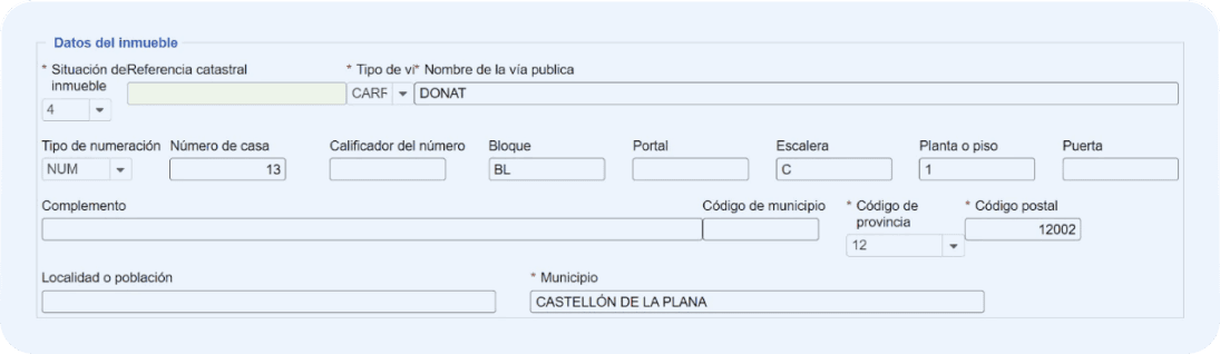 Pantalla de datos del inmueble del modelo 180 donde deberás completar: dirección completa y referencia castral.